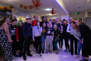 Our senior youth club, volunteers and staff posing for a photo