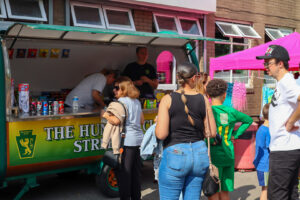 People lining up outside of the pod - a food outlet at The Hunslet Club